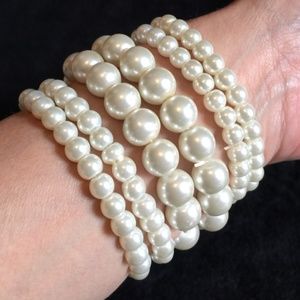 6 WHITE FAUX PEARL BRACELETS (STRETCHY)
